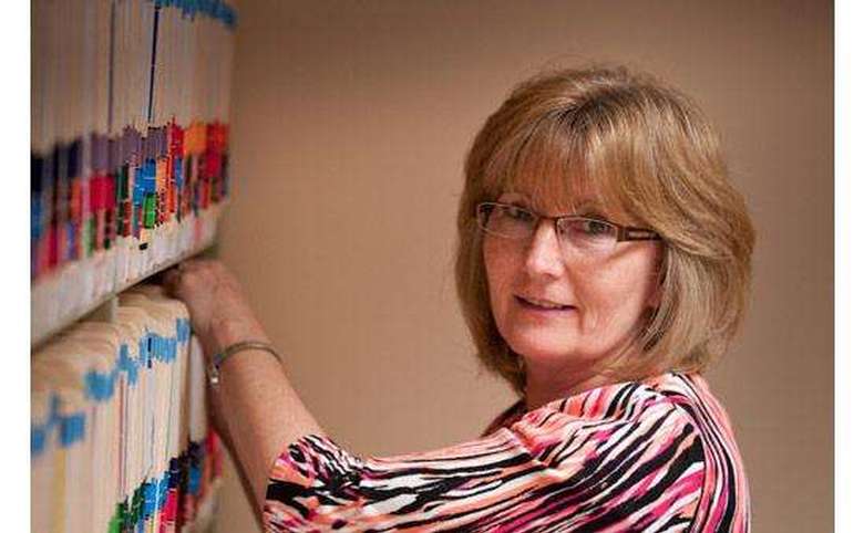 WWWoman looking through files