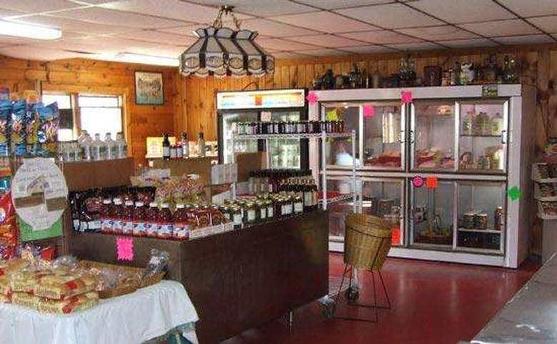displays food and beverage products in a small store
