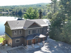 house in front of a lake