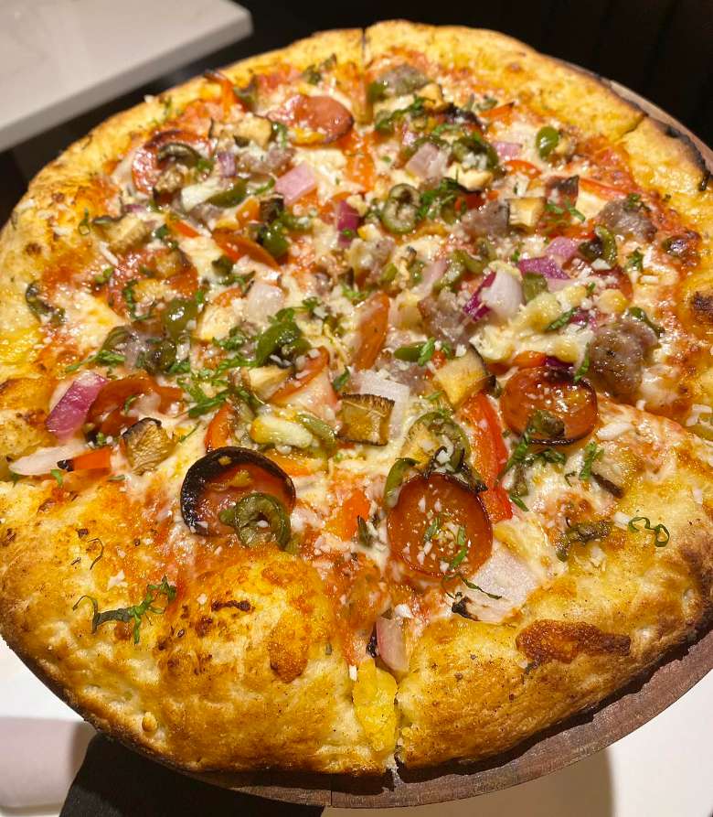 vegetable and pepperoni pizza