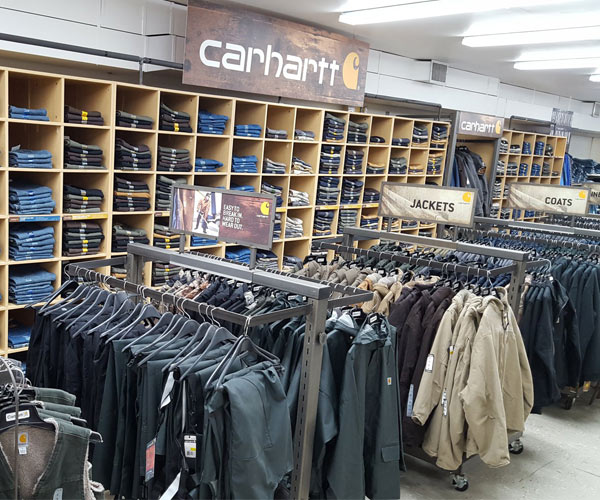 racks and shelves of carhartt clothing