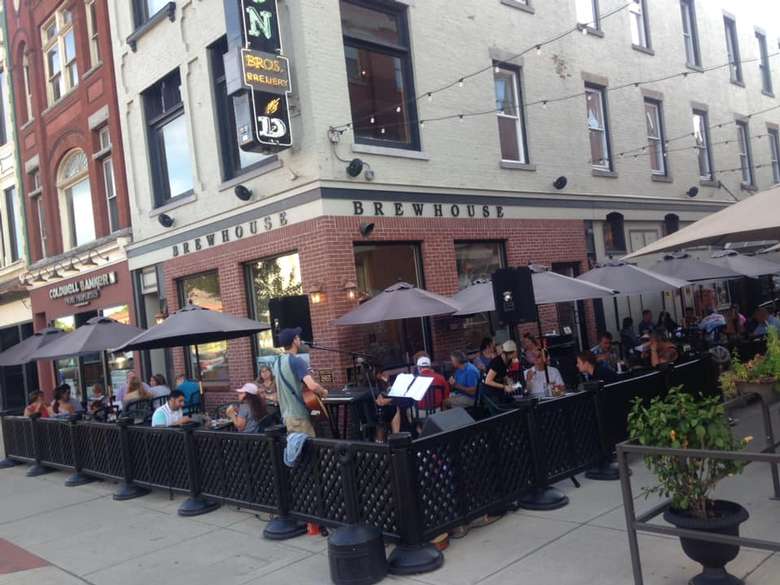 people on patio outside a restaurant