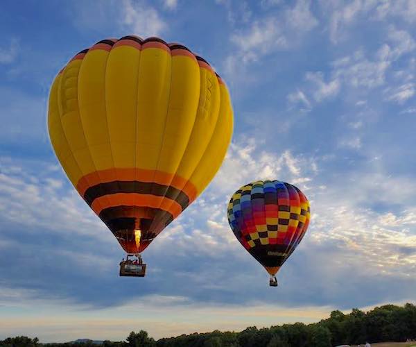 two air balloons in the sky