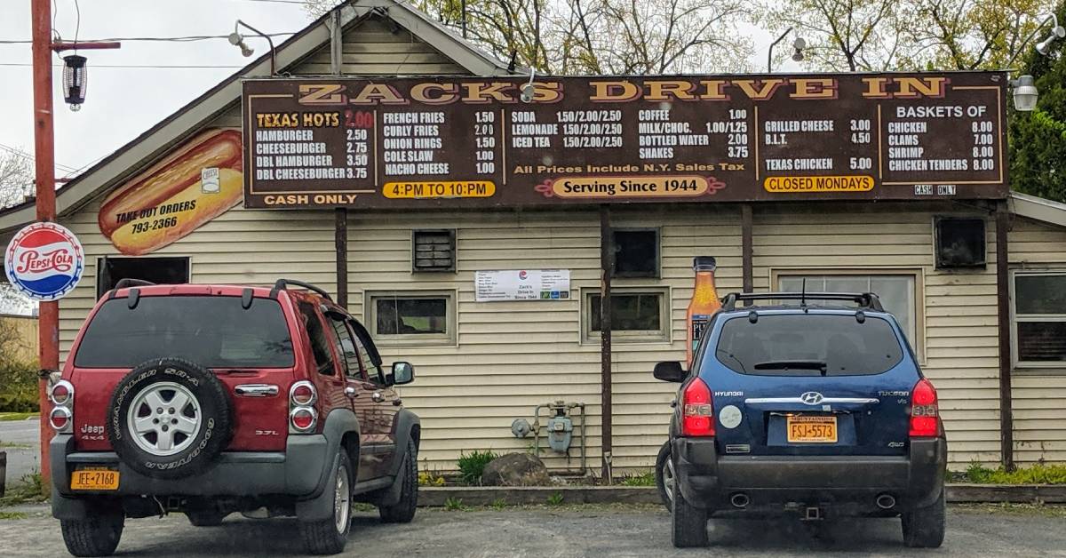 signage at zack's drive in