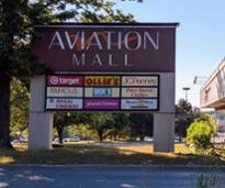 aviation mall sign with stores listed