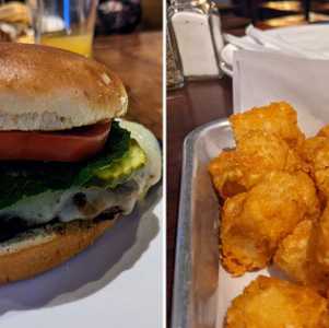 burger on left, tator tots on right