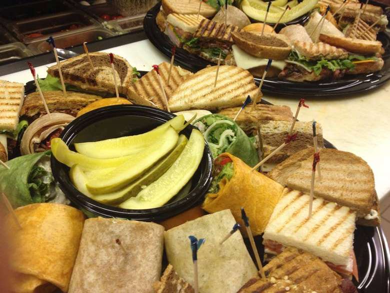 Various sandwiches and wraps on large plater