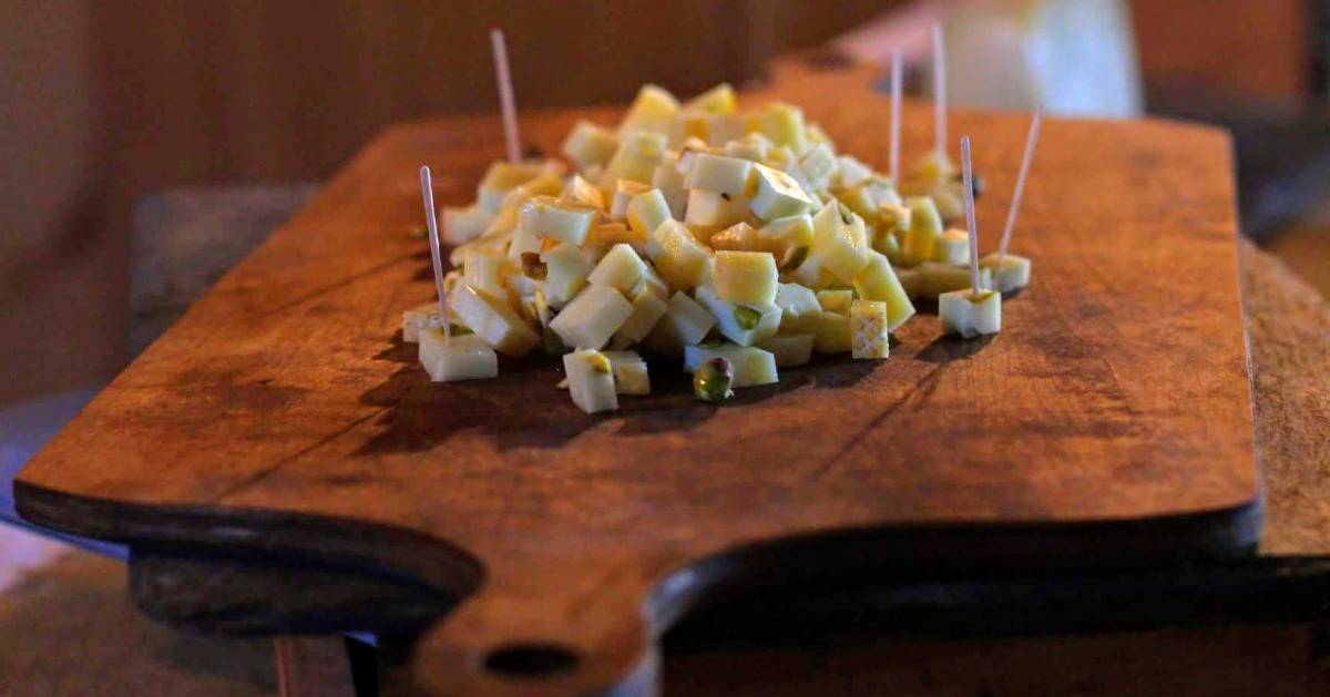 cheese samples on a board