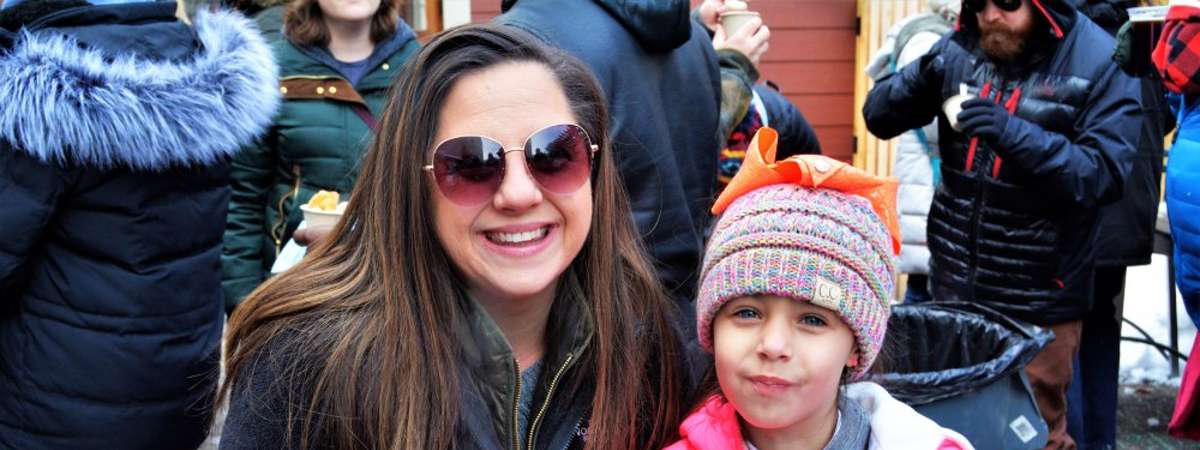 woman and girl with chowder samples