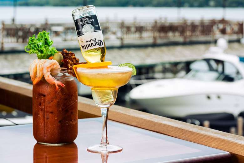 Two drinks on a table outdoors