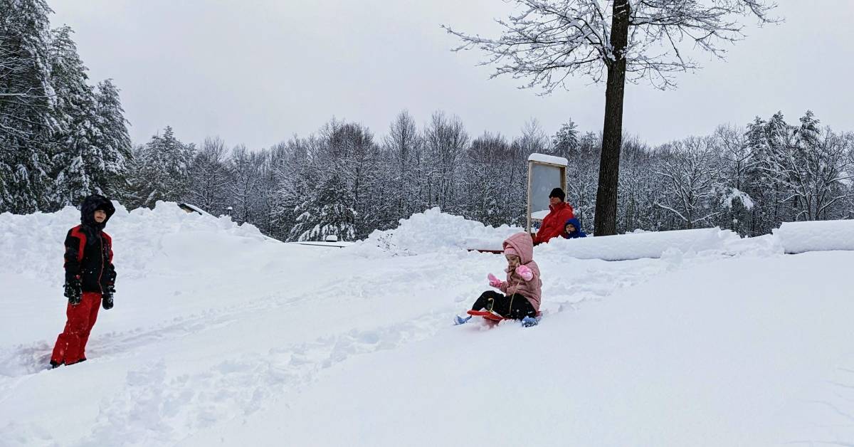 kids on snow hill for sledding at gurney lane