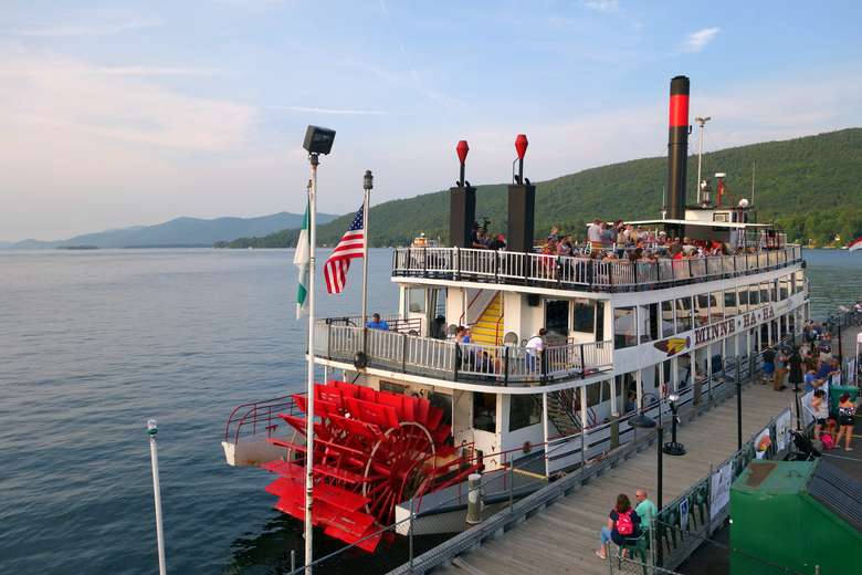 the minnehaha paddlewheel steamboat docked at its pier on lake george