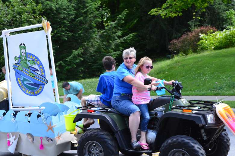 Woman and girl on ATV