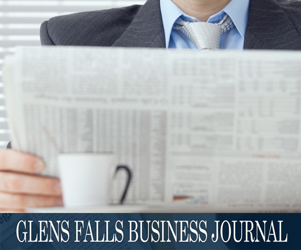 man reading a newspaper