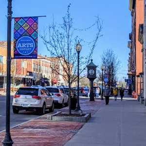 downtown glens falls with arts district sign