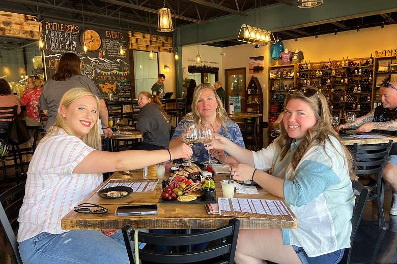 Some friends enjoying our wine and a charcuterie board