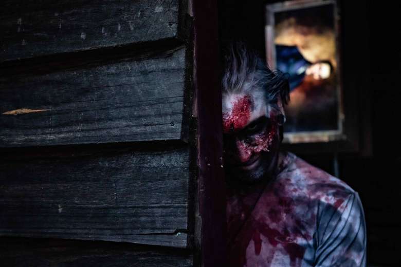 actor dressed in bloody costume