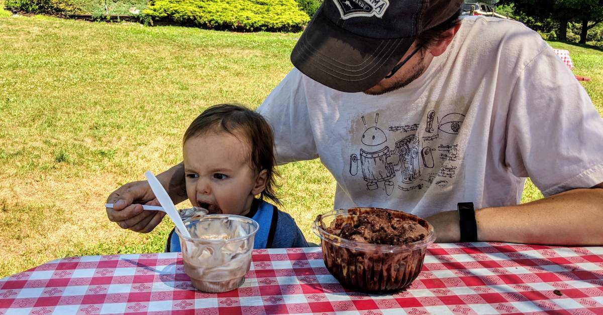 dad and son eating battenkill valley creamery ice cream