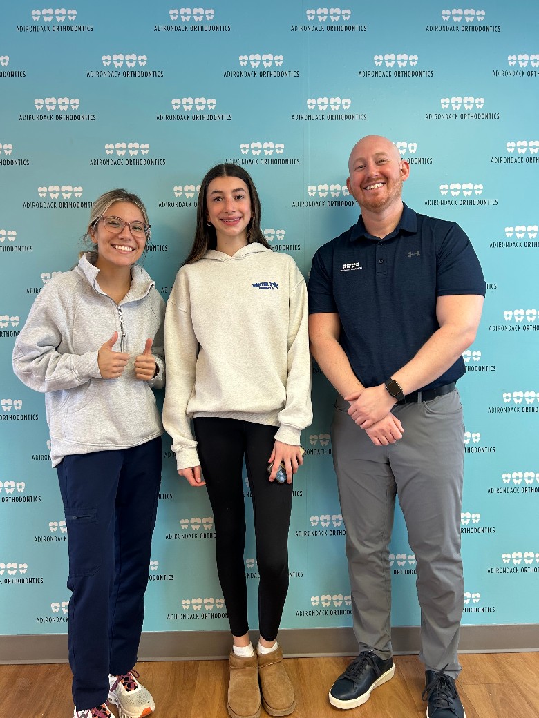 orthodontist team and patient