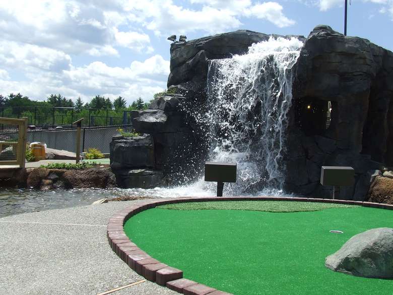 part of the golf course with a waterfall