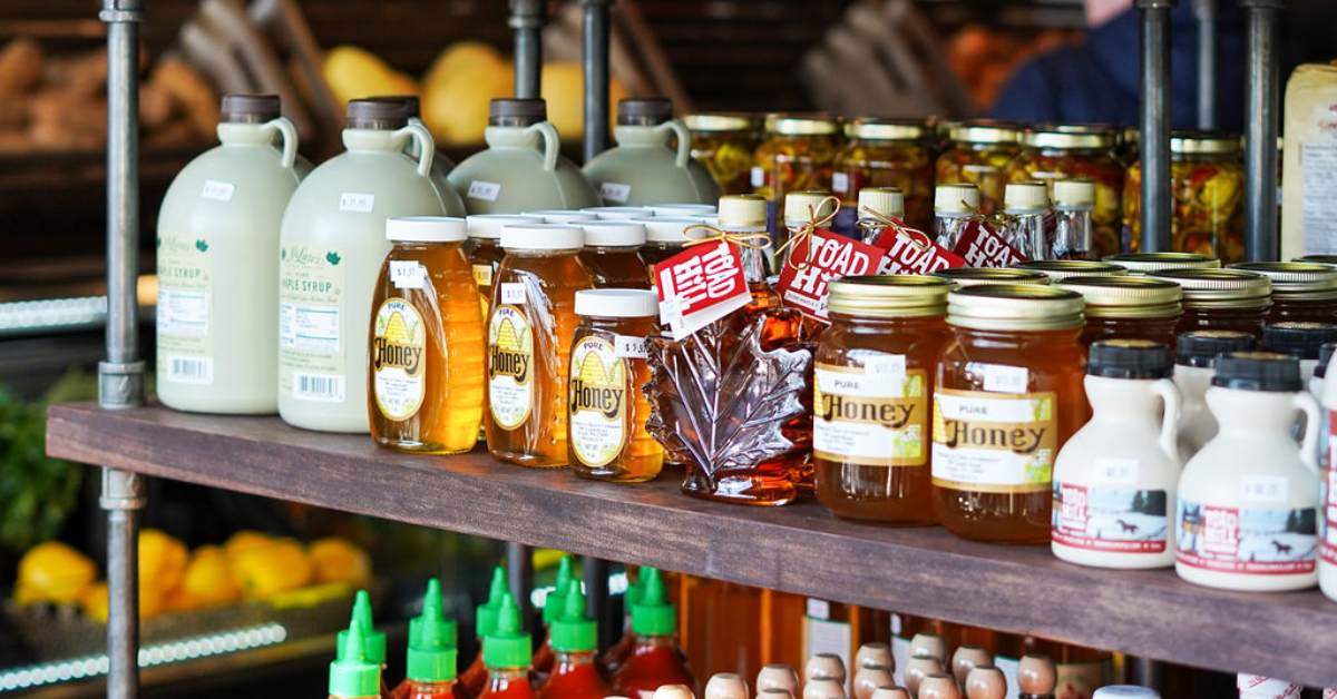 maple syrup and honey on shelves