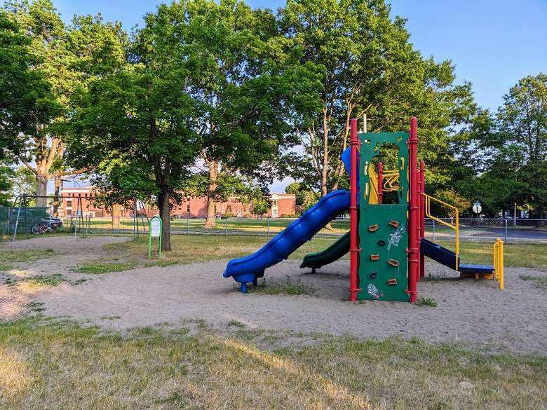 playground with slide and climbing wall
