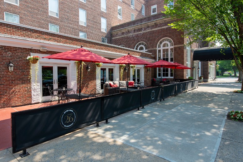 patio dining area with red umbrellas