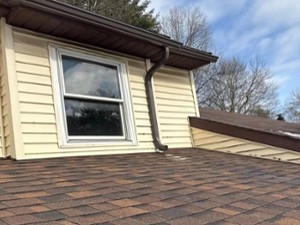 brown roof with gutter