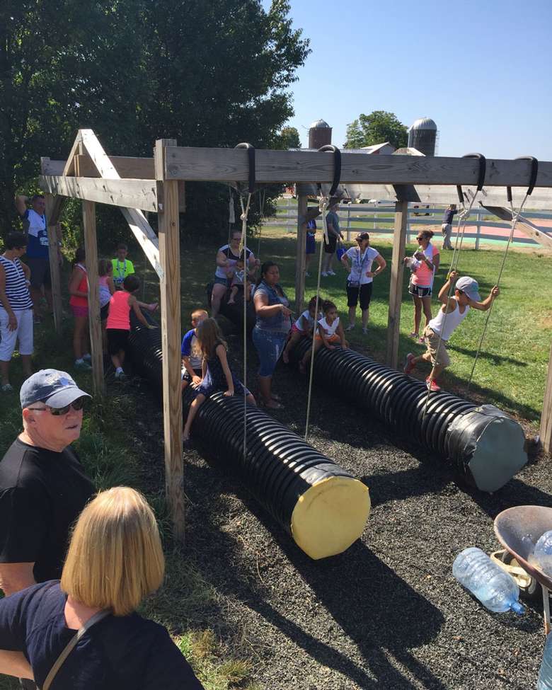 kids playing on tube gliders
